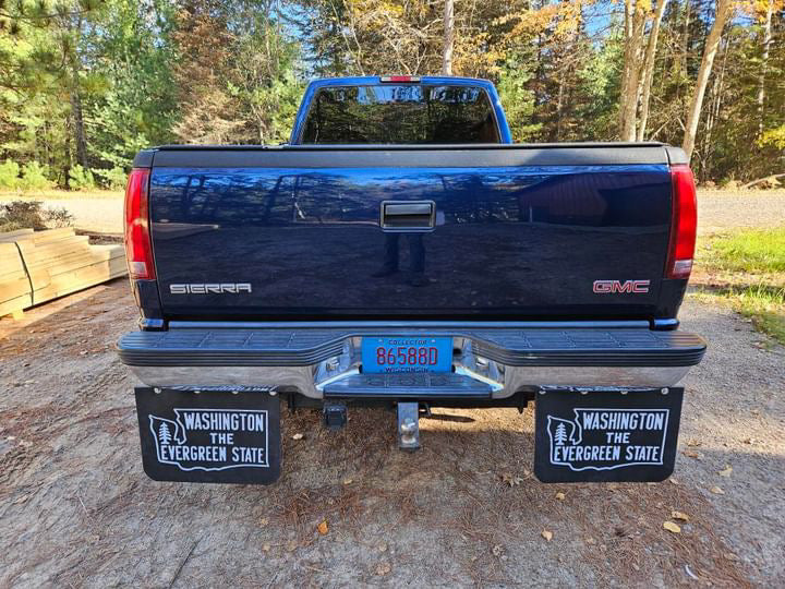 Modern GMC truck with Evergreen State Washington mudflaps