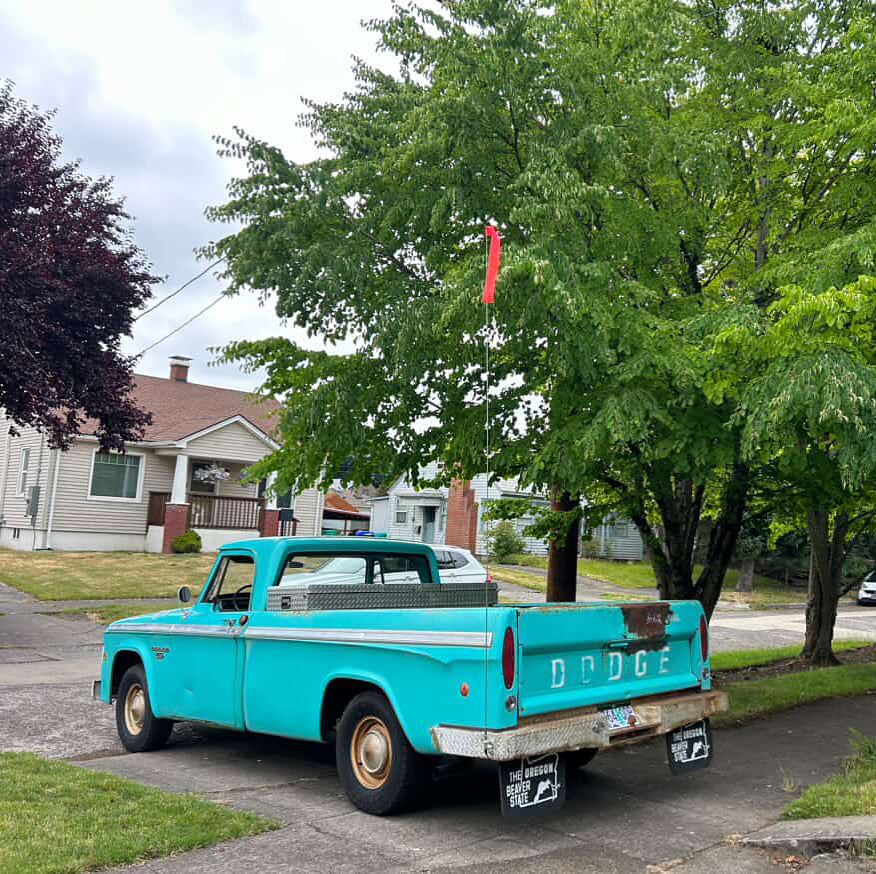Dodge truck fitted with vintage Oregon Beaver State mudflaps