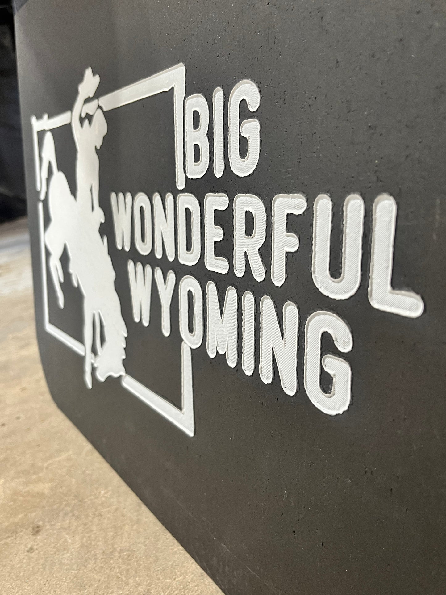Close up detail of Wyoming Big Wonderful state vintage mudflaps
