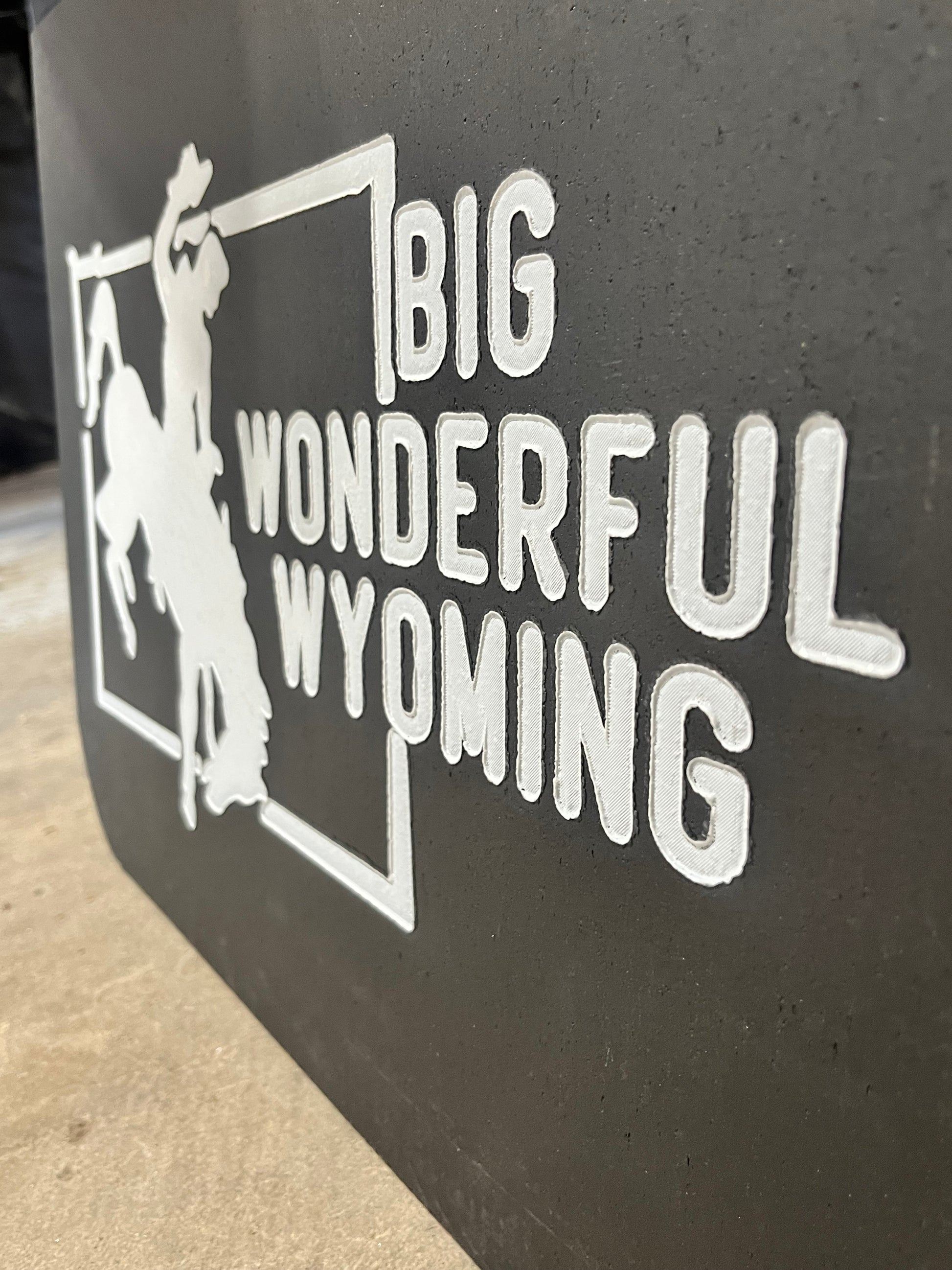 Close up detail of Wyoming Big Wonderful state vintage mudflaps