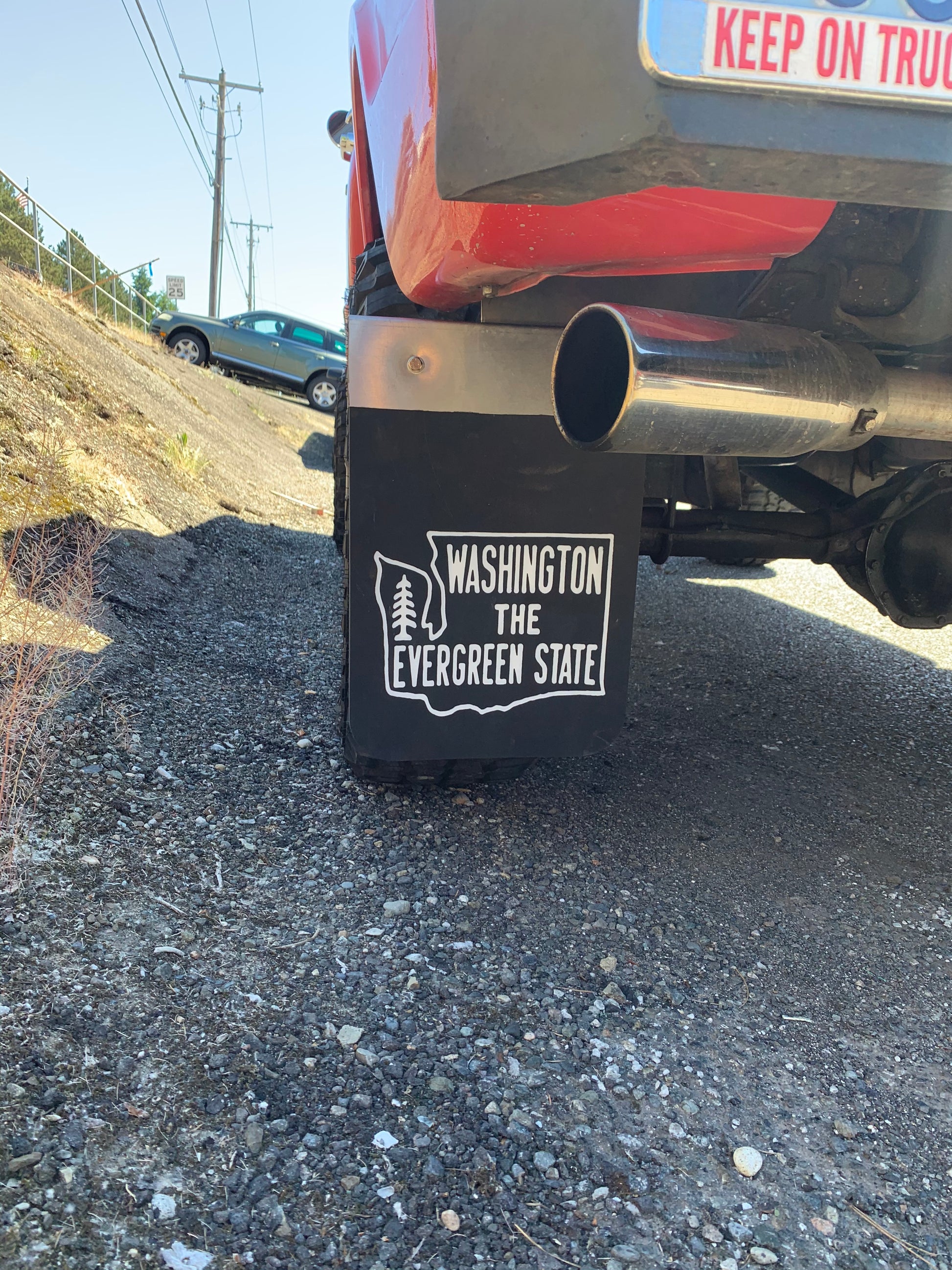 Close up of pickup fitted with Evergreen State Washington mudflaps