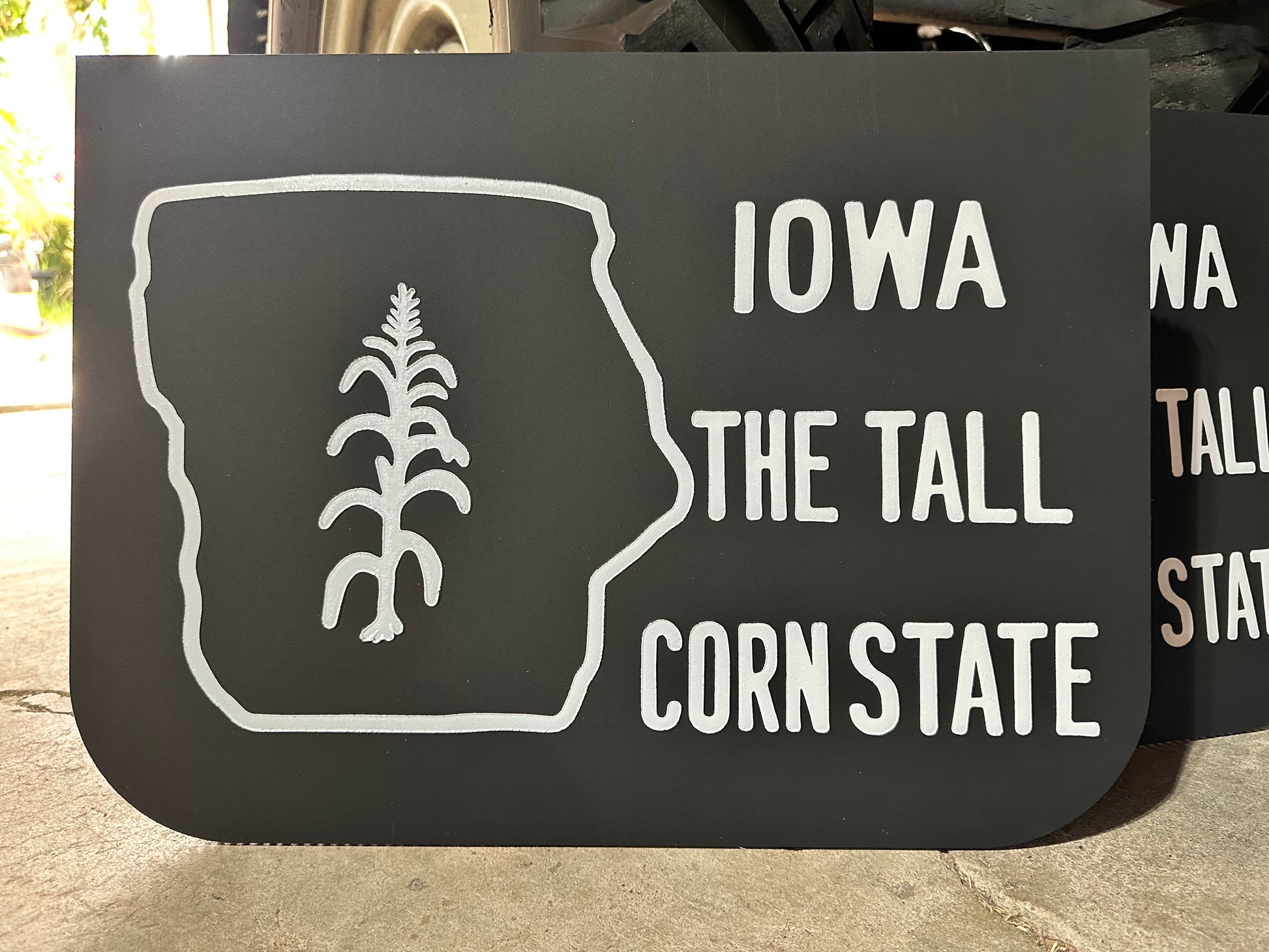 Close up of vintage inspired Iowa Tall Corn State wide mudflaps