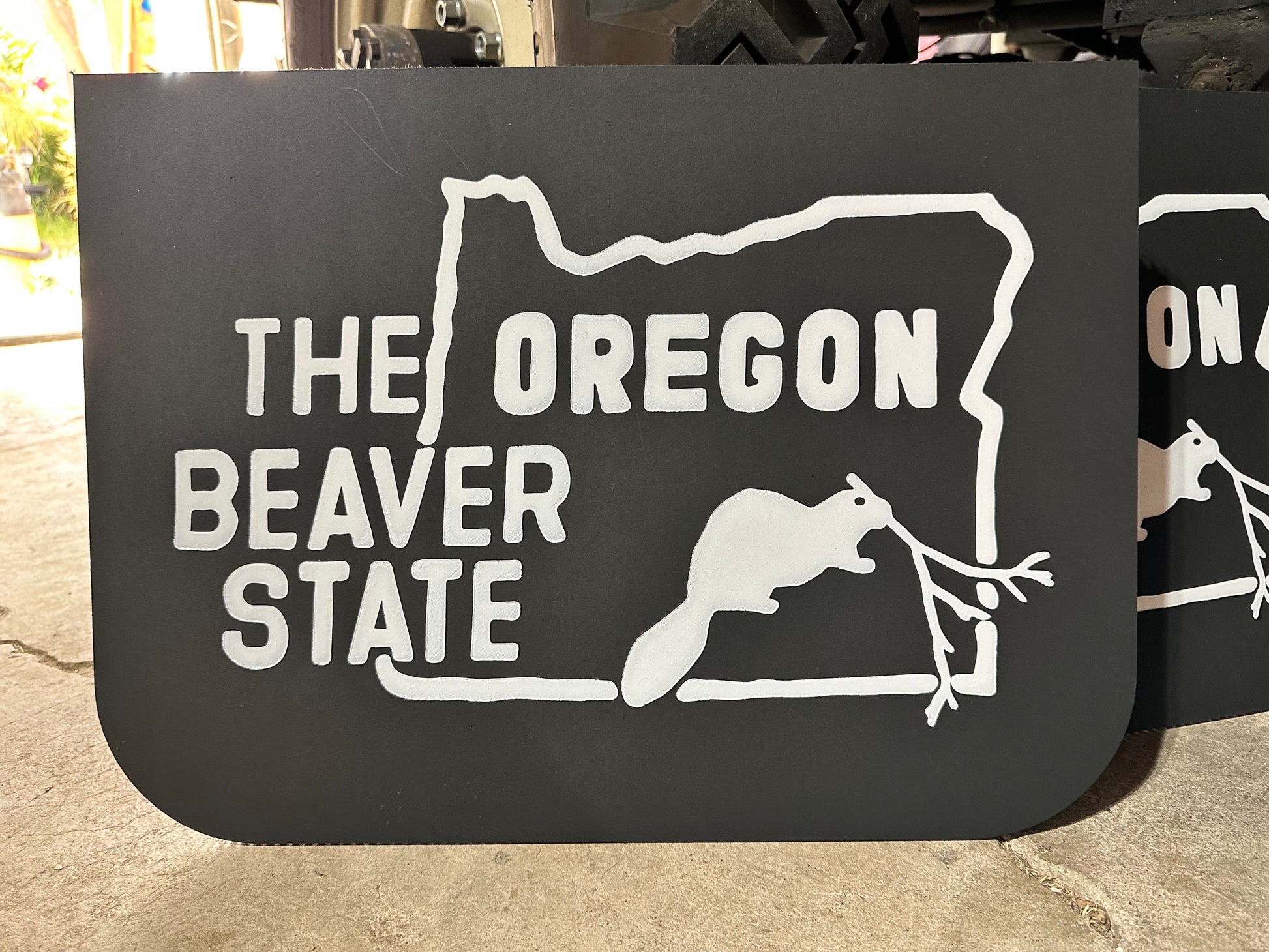 Close up of retro Oregon Beaver State wide mudflaps